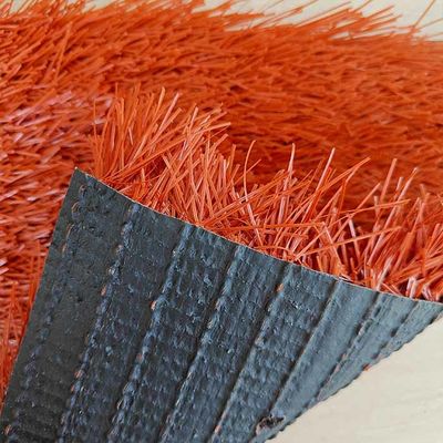 ผงแดง 40 มิลลิเมตร ความสูง 12000 Dtex ฟุตบอลหญ้าเทียมสําหรับสถานที่กีฬา